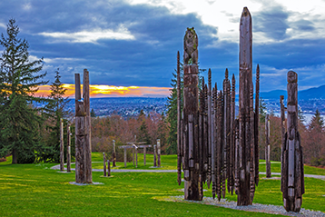 Wood carvings on Burnaby Mountain overlooking the valley.
