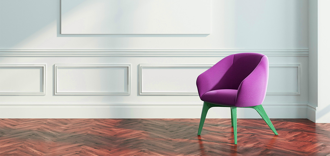 A empty chair in a beautiful room with hardwood flooring.