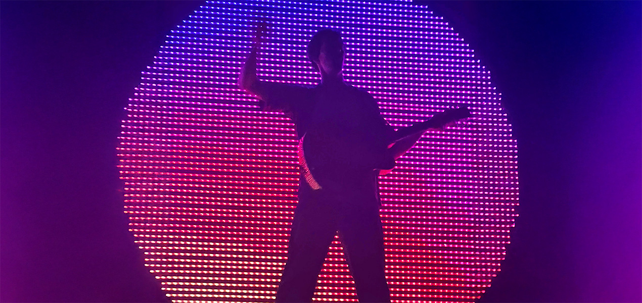 A musician about to perform on stage.