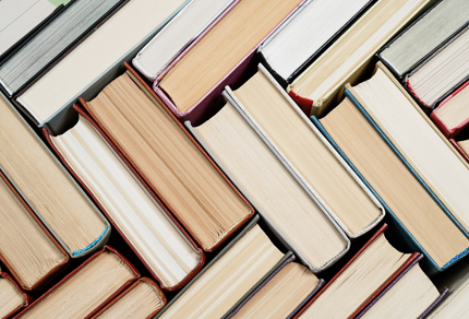 Books stacked in a chevron pattern.
