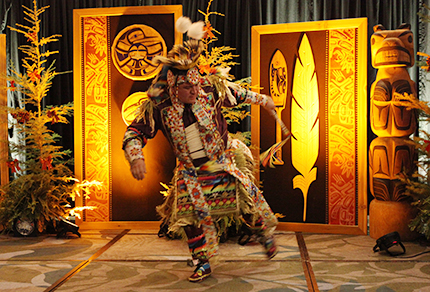 An Indigenous dancer performing at the ALF Holiday Banquet.