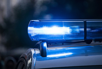 Close up of the lights on top of a police car.
