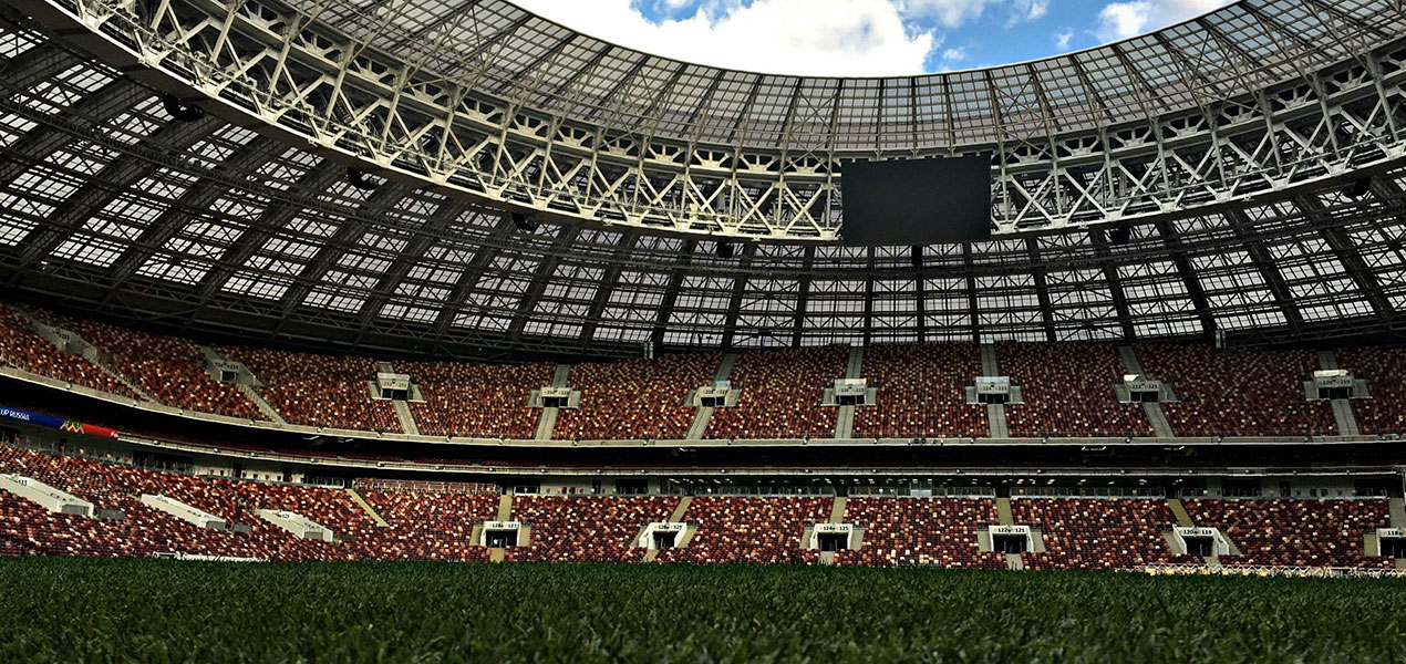 A large empty sports stadium.