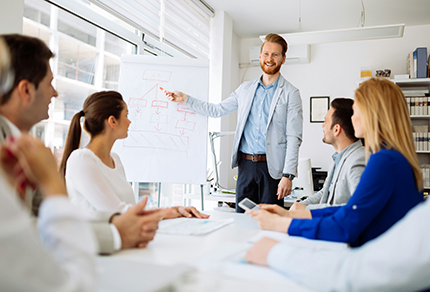 A manager leading a team meeting.