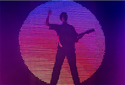 A musician about to perform on stage.