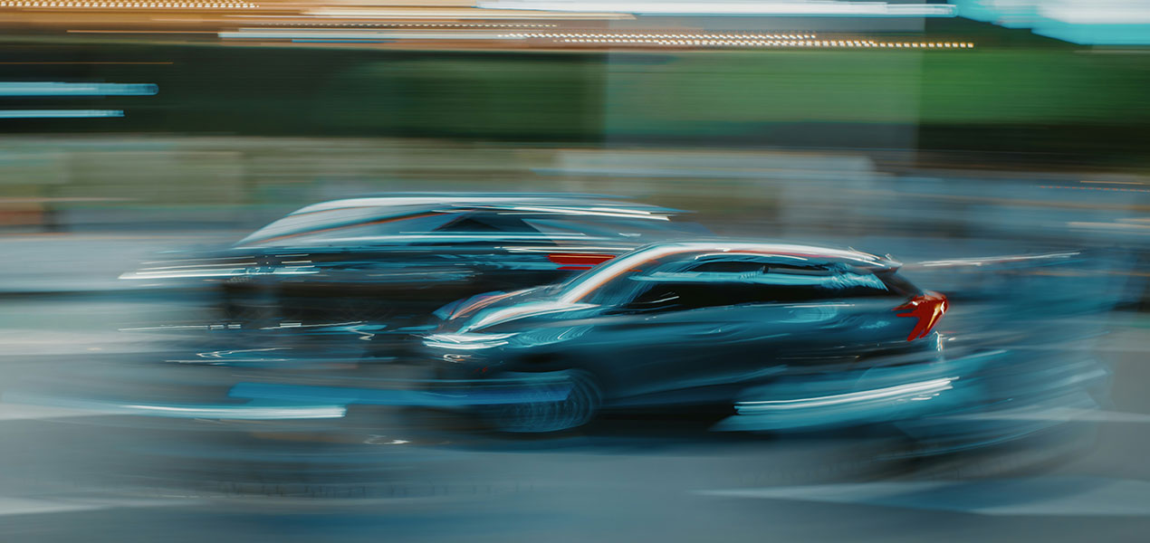 Two vehicles very close together about to crash into each other. 